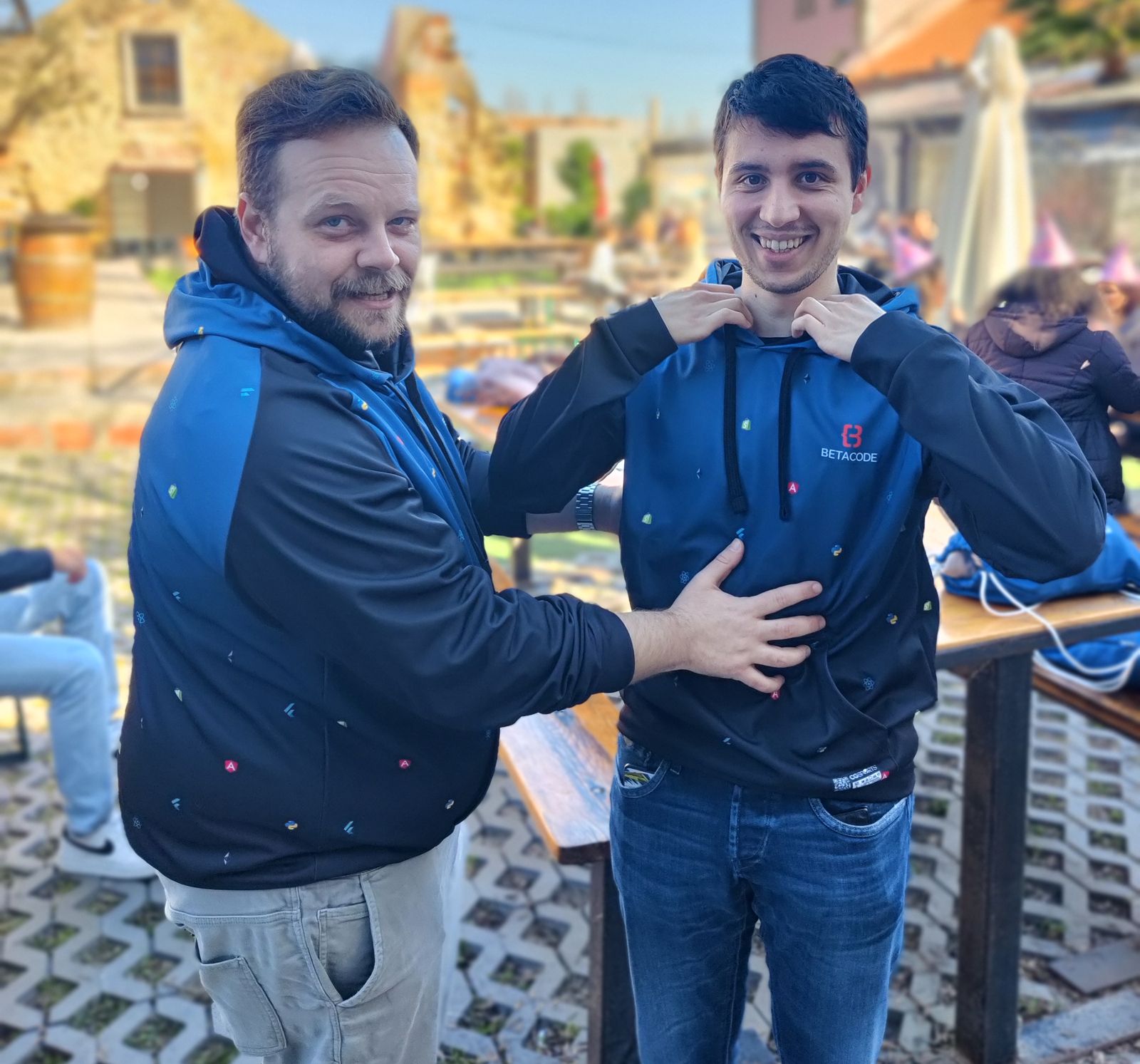 Two Betacode team members laughing